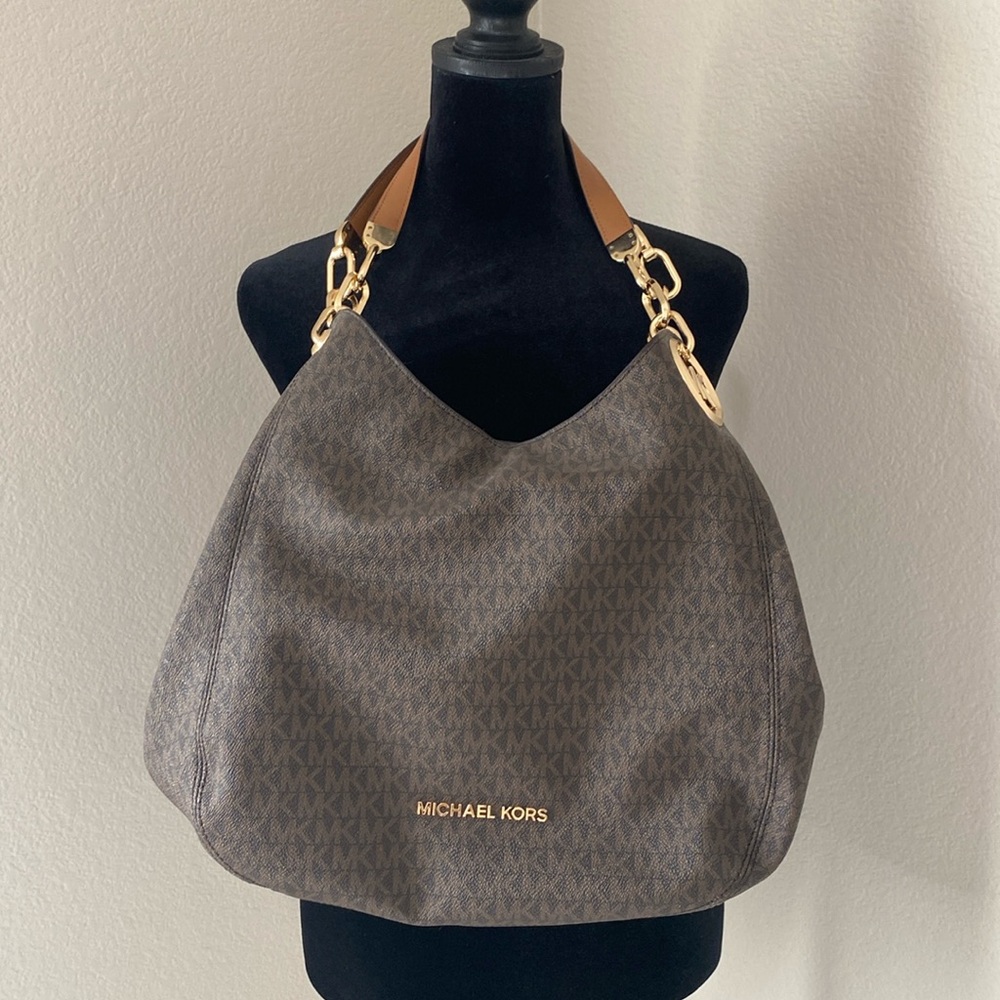 Michael Kori’s Brown slouch handbag
